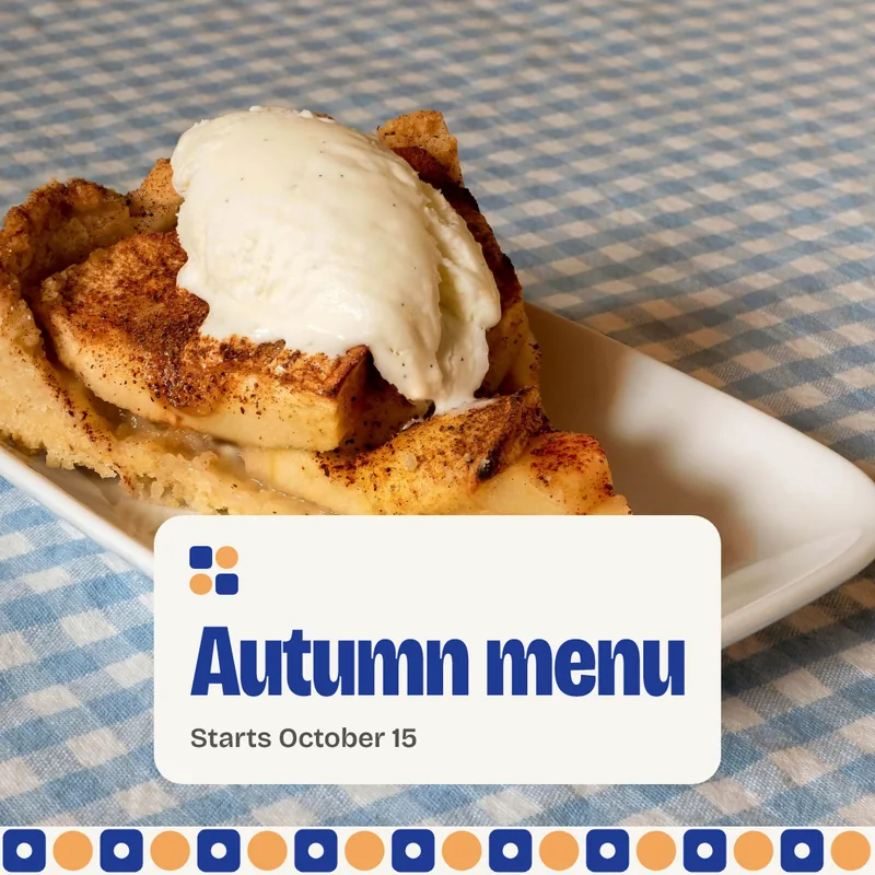 Concept square post for the fictional Cobalt Crumb Cafe: apple cake with ice cream and a paper label reading Autumn menu, starts October 15.